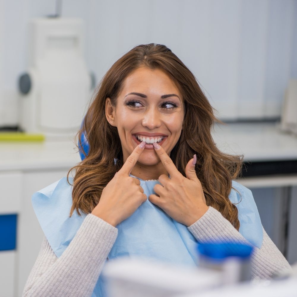 Paciente feliz de Rubal Dental